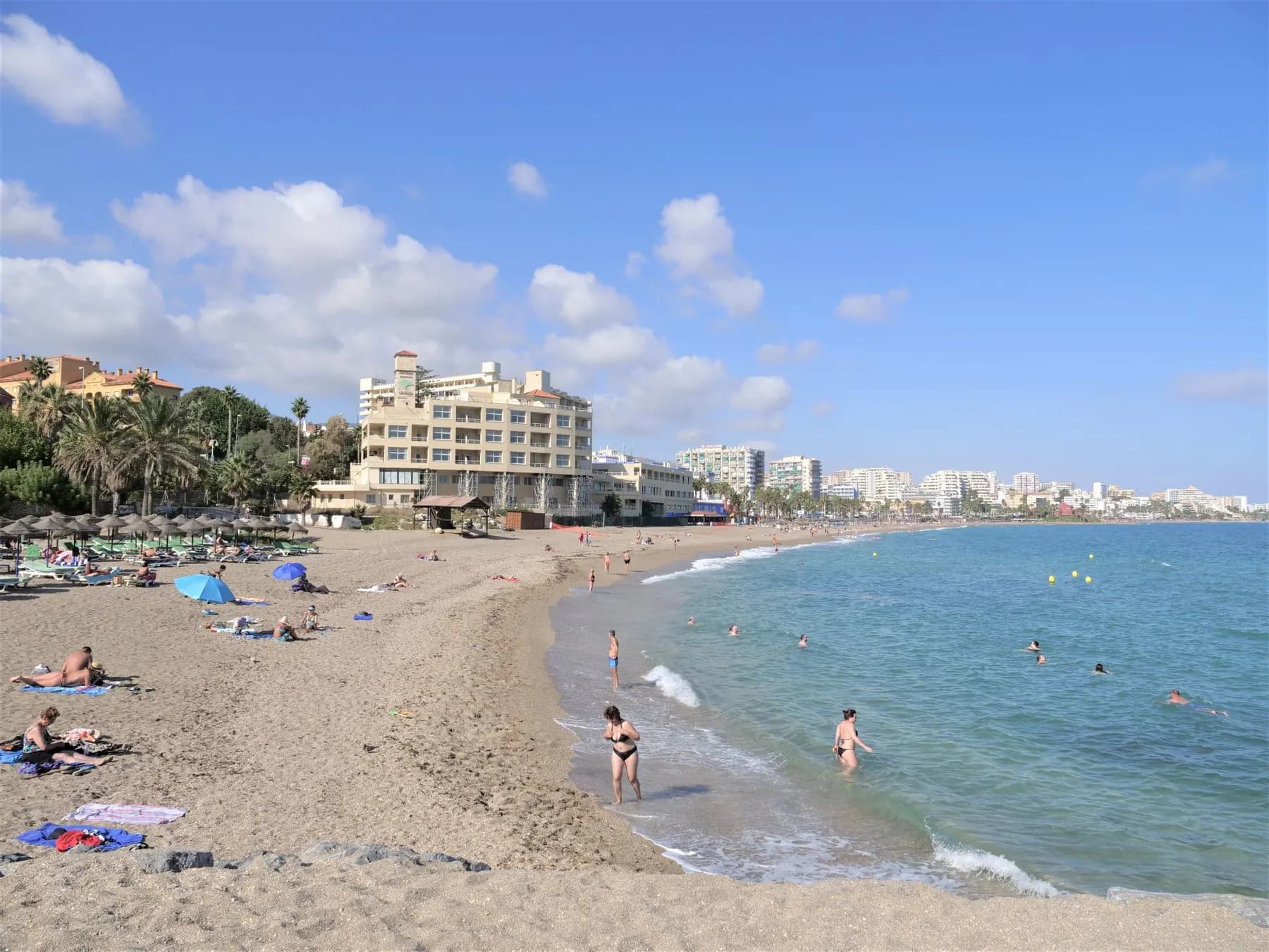 Sunny beach and seafront of Benalmádena Costa on the Costa del Sol